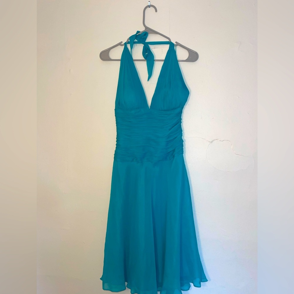 - Caché aquamarine silk halter dress from the 90s